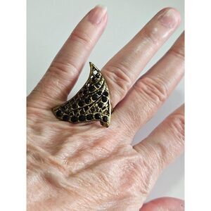 Gold tone adjustable ring with black